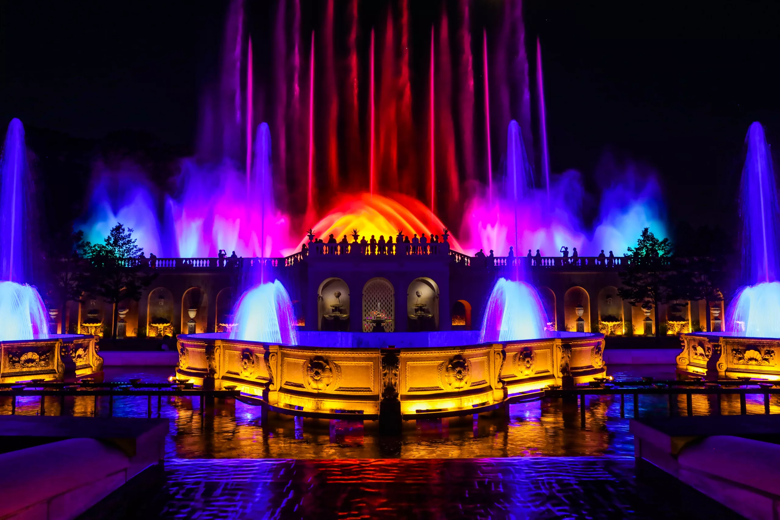 A colorful fountain and light show held at Longwood gardens during summer nights.